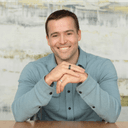 A photo of AJ Tennant, Slack's first sales leader